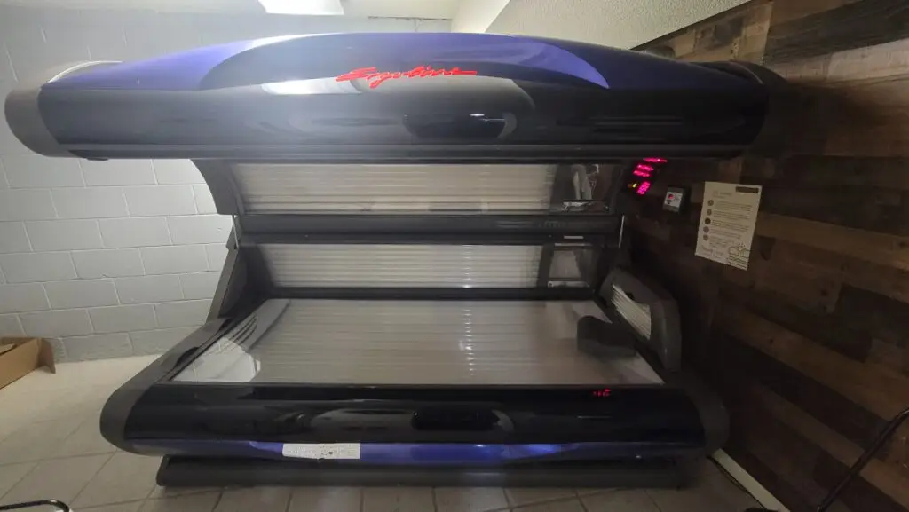 large tanning bed showing off new bulbs and clean surfaces