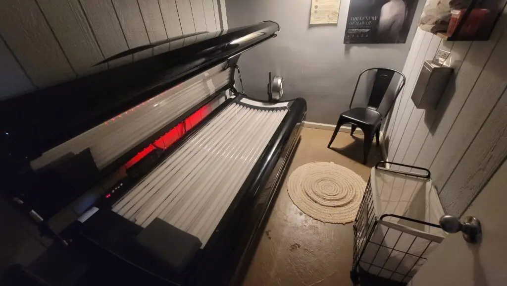 Private tanning room with clean bed