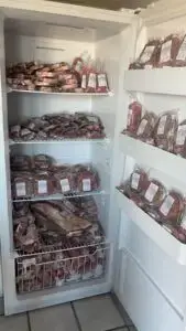 Freezer full of Cox Cattle Co. beef products for sale at Lyndsay L. Salon